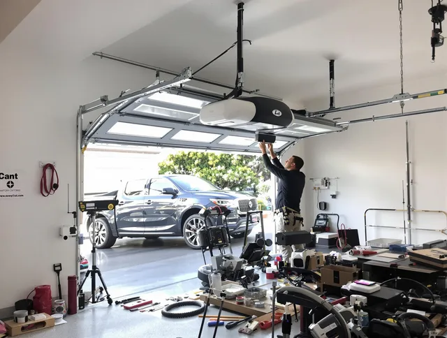 Swansea Garage Door Repair specialist installing smart garage door opener system in Swansea home