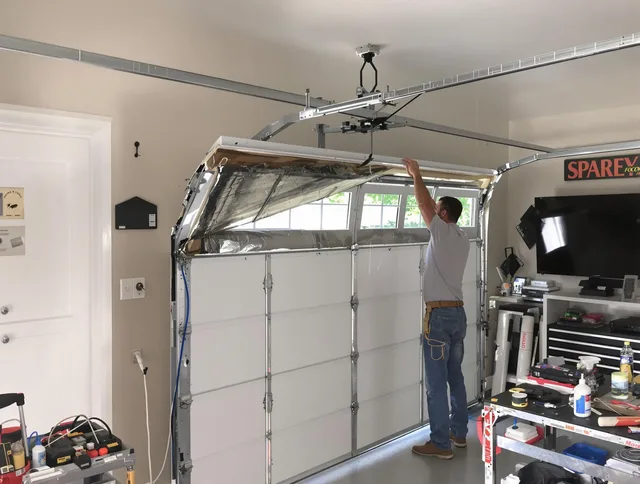 Garage door section replacement by Swansea Garage Door Repair in Swansea