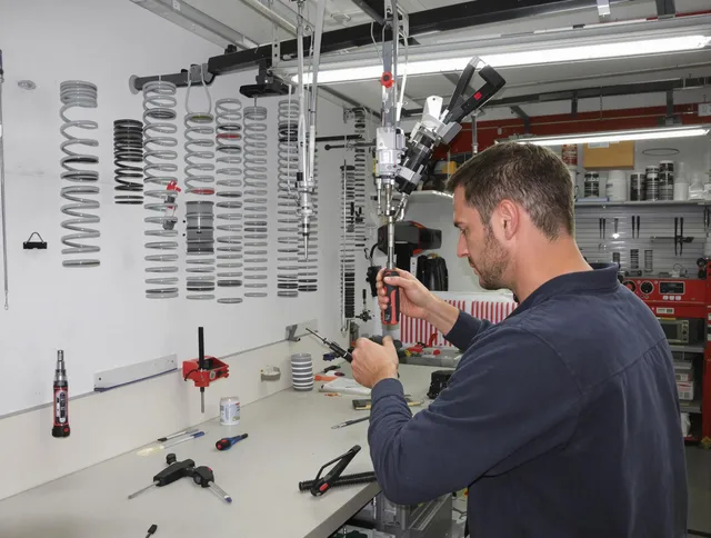 Swansea Garage Door Repair safety certified technician performing precision spring replacement in Swansea