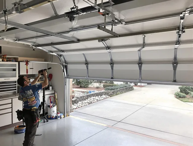 Garage door track repair service by Swansea Garage Door Repair in Swansea